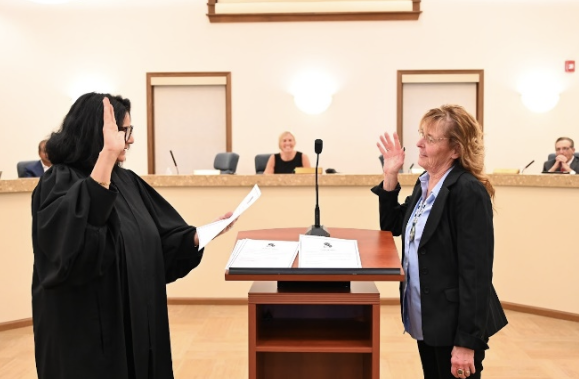 Swearing in of Dr Stagno by retired Honorable Judge Ketki Steffen and Clerk Dr. M. Stagno. 